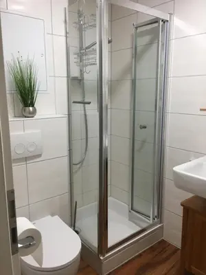 Ein Badezimmer in der Unterkunft CHALET ANTON Braunlage Design Apartment