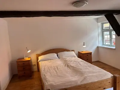 Ein Bett oder Betten in einem Zimmer der Unterkunft Maisonette im Fachwerkhaus