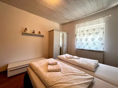 Ein Bett oder Betten in einem Zimmer der Unterkunft Ferienhaus Harzseele