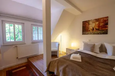 Ein Bett oder Betten in einem Zimmer der Unterkunft Ferienwohnung Hexenloft