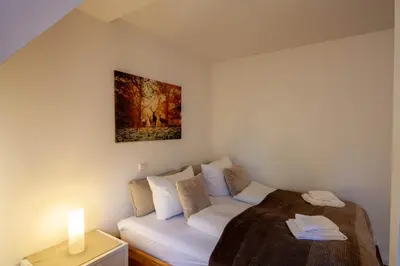 Ein Bett oder Betten in einem Zimmer der Unterkunft Ferienwohnung Hexenloft