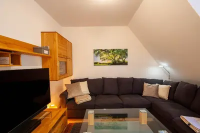 Ein Sitzbereich in der Unterkunft Ferienwohnung Hexenloft