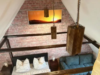 Ein Sitzbereich in der Unterkunft Ferienwohnung Glück Auf