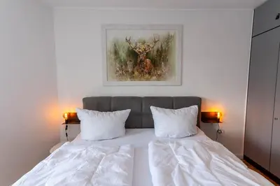 Ein Bett oder Betten in einem Zimmer der Unterkunft Ferienwohnung Bergverliebt mit Balkon und Traumblick