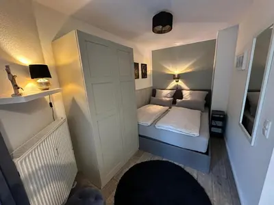 Ein Bett oder Betten in einem Zimmer der Unterkunft Harzzeit