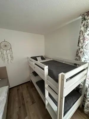 Ein Bett oder Betten in einem Zimmer der Unterkunft HarzZeit Braunlage