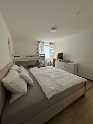 Ein Bett oder Betten in einem Zimmer der Unterkunft HarzZeit Braunlage