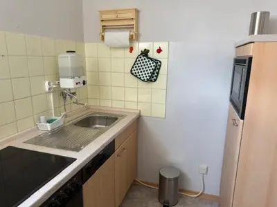 Küche/Küchenzeile in der Unterkunft Terrassenappartment im Harz