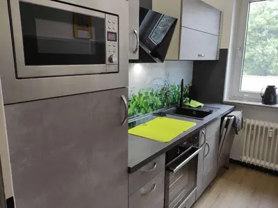 Küche/Küchenzeile in der Unterkunft Ferienwohnung Penthouse Bummelallee
