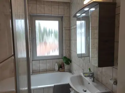 Ein Badezimmer in der Unterkunft Ferienwohnung Penthouse Bummelallee