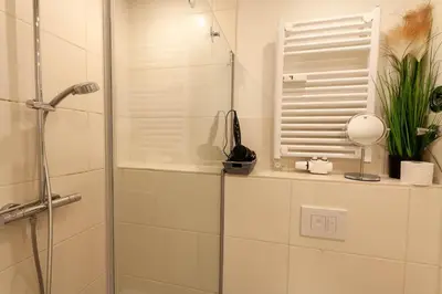 Ein Badezimmer in der Unterkunft Kleine Bergsuite mit Terrasse