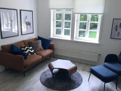 Ein Sitzbereich in der Unterkunft Waldhaus Staufenbergblick in Zorge