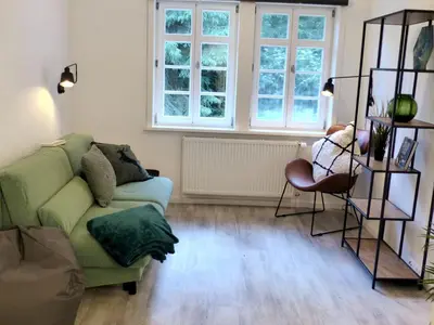 Ein Sitzbereich in der Unterkunft Waldhaus Staufenbergblick in Zorge