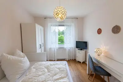 Ein Bett oder Betten in einem Zimmer der Unterkunft Ferienwohnung Bergfreude mit Balkon