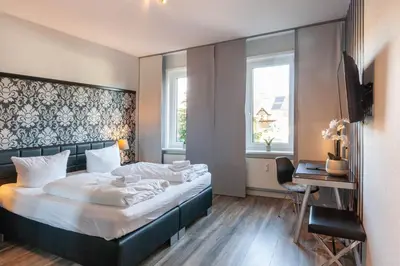Ein Bett oder Betten in einem Zimmer der Unterkunft Ferienwohnung Bergprinz mit Terrasse