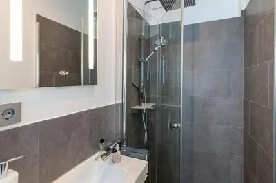 Ein Badezimmer in der Unterkunft Ferienwohnung Harzlaune mit Balkon und Wurmbergblick
