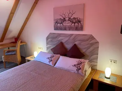 Ein Bett oder Betten in einem Zimmer der Unterkunft Gipfel Lounge