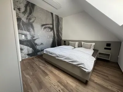 Ein Bett oder Betten in einem Zimmer der Unterkunft Stilapartment Oasis 2