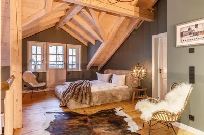 Ein Bett oder Betten in einem Zimmer der Unterkunft Landhaus Gutshaus