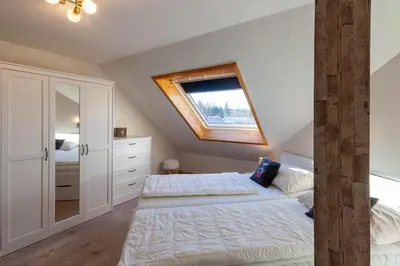 Ein Bett oder Betten in einem Zimmer der Unterkunft Ferienwohnung Bergblick mit Balkon