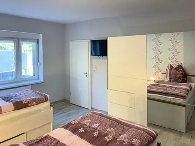 Ein Bett oder Betten in einem Zimmer der Unterkunft Zur Teufelsmauer