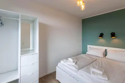 Ein Bett oder Betten in einem Zimmer der Unterkunft Apartment Gipfelblick mit Balkon