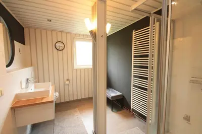 Ein Badezimmer in der Unterkunft Ferienhaus Harzer Budenzauber mit Sauna