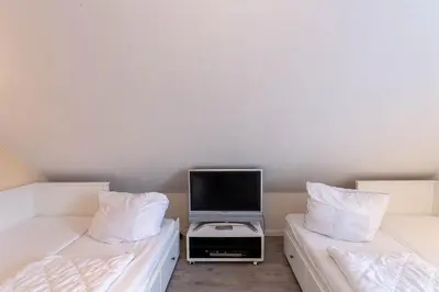 Ein Bett oder Betten in einem Zimmer der Unterkunft Ferienhaus Huckla