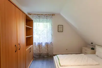 Ein Bett oder Betten in einem Zimmer der Unterkunft Ferienhaus Huckla