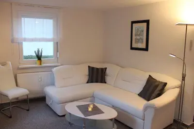 Ein Sitzbereich in der Unterkunft Ferienwohnung Arlt