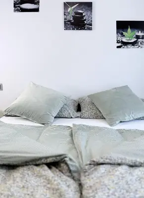 Ein Bett oder Betten in einem Zimmer der Unterkunft Villa Palmwiesen
