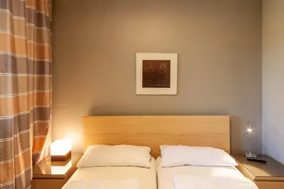Ein Bett oder Betten in einem Zimmer der Unterkunft Ferienwohnung Mauna Kea