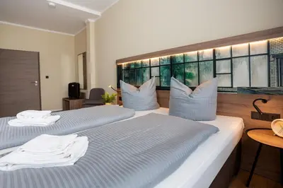 Ein Bett oder Betten in einem Zimmer der Unterkunft Lieblingsquartier 14
