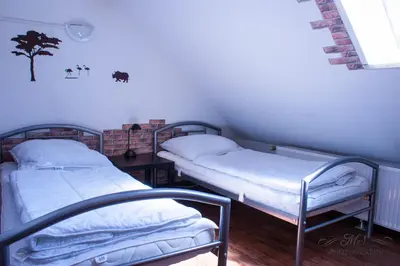 Ein Bett oder Betten in einem Zimmer der Unterkunft Gruppenhaus bis 14 Personen im Südharz