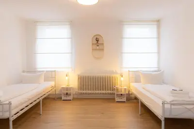 Ein Bett oder Betten in einem Zimmer der Unterkunft Ferienwohnung Tatort