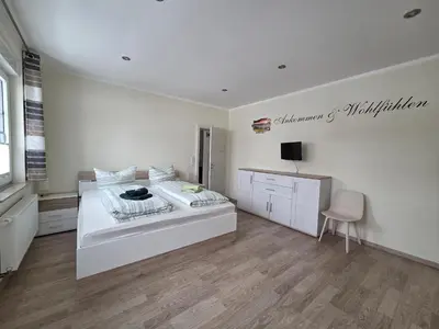 Ein Bett oder Betten in einem Zimmer der Unterkunft Harznester Schierke
