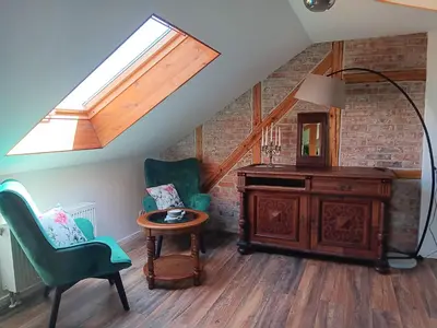 Ein Sitzbereich in der Unterkunft Ferienwohnung Harzteufel