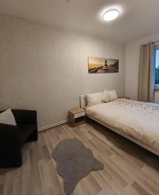 Ein Bett oder Betten in einem Zimmer der Unterkunft FeWo im Harz Bad Harzburg