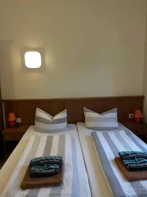 Ein Bett oder Betten in einem Zimmer der Unterkunft Ferienwohnungen am Roland