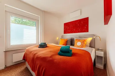 Ein Bett oder Betten in einem Zimmer der Unterkunft Little Red Wood
