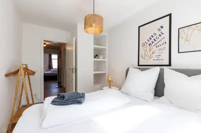 Ein Bett oder Betten in einem Zimmer der Unterkunft PrimeLoft 
