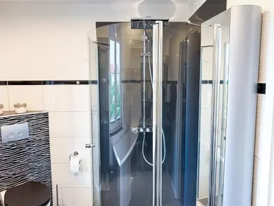Ein Badezimmer in der Unterkunft WILD&COZY Ferienhaus mit 160m2, Garage und 2 Bäder