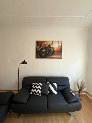 Ein Sitzbereich in der Unterkunft City-Apartment