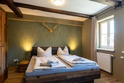 Ein Bett oder Betten in einem Zimmer der Unterkunft Zum Ratsdiener mit Parkplatz