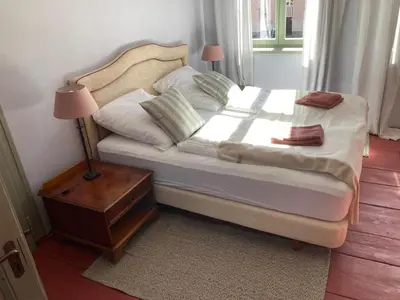 Ein Bett oder Betten in einem Zimmer der Unterkunft Gästehaus Unter den Weiden, Halberstadt