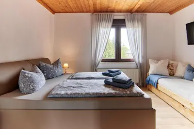 Ein Bett oder Betten in einem Zimmer der Unterkunft Haus Freigeist - Friedrichssuite