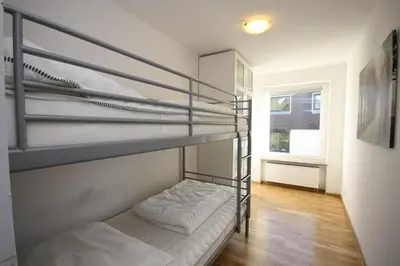 Ein Bett oder Betten in einem Zimmer der Unterkunft Ferienhaus Jennie