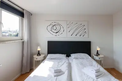 Ein Bett oder Betten in einem Zimmer der Unterkunft Ferienhaus Malte