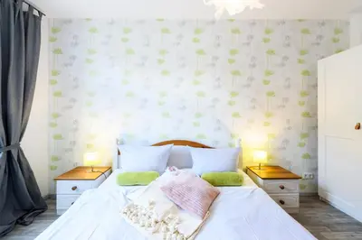 Ein Bett oder Betten in einem Zimmer der Unterkunft Ackerbürgerhof Ballstraße 18