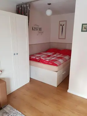 Ein Bett oder Betten in einem Zimmer der Unterkunft Apartment Kleiner Heinrich